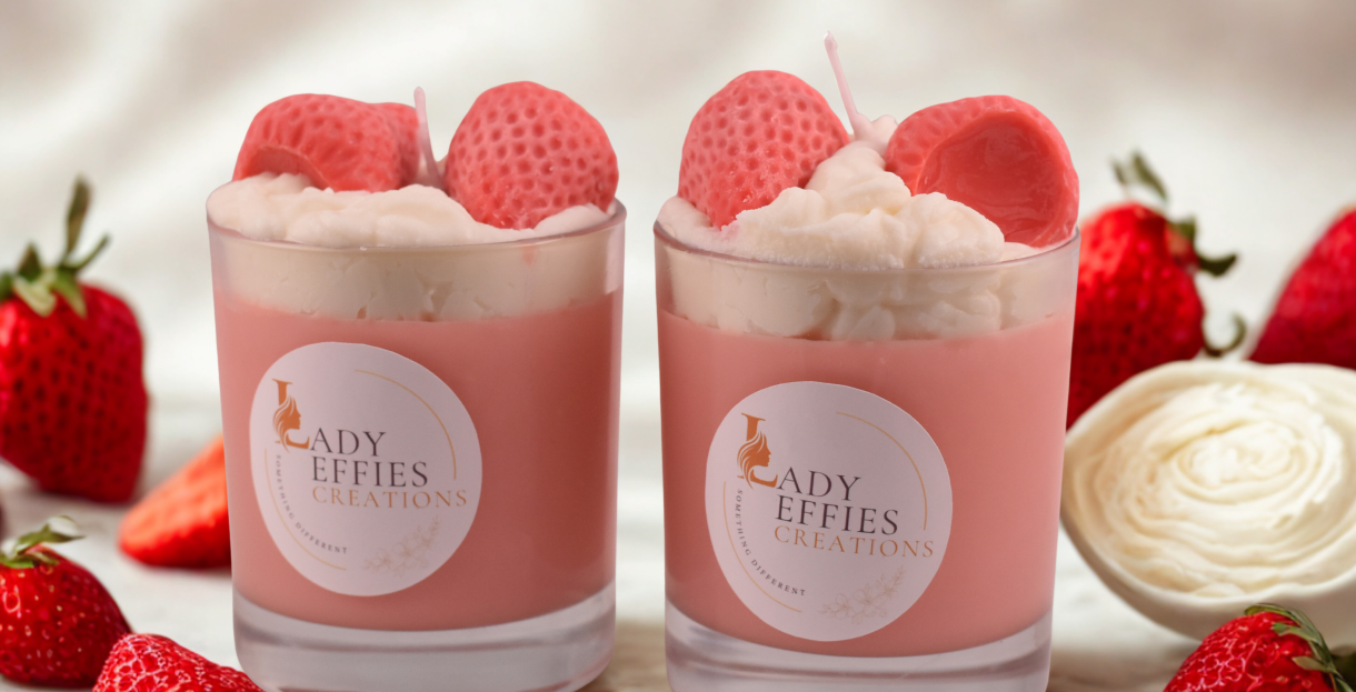 candles in jars with decorative strawberries and cream